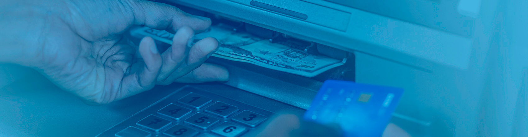 Cash being dispensed from an ATM