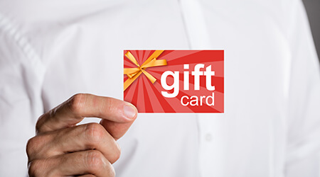 Man holding a gift card